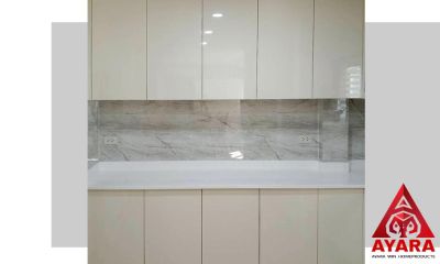 ชุดครัว Built-in โครงซีเมนต์บอร์ด หน้าบาน Hi Gloss สีครีมเงา