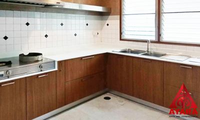 ชุดครัว Built-in โครงซีเมนต์บอร์ด หน้าบาน Laminate สี Can Walnut ลายไม้