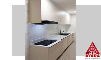 ชุดครัว Built-in โครงซีเมนต์บอร์ด หน้าบาน Melamine สีครีม ผิวส้ม